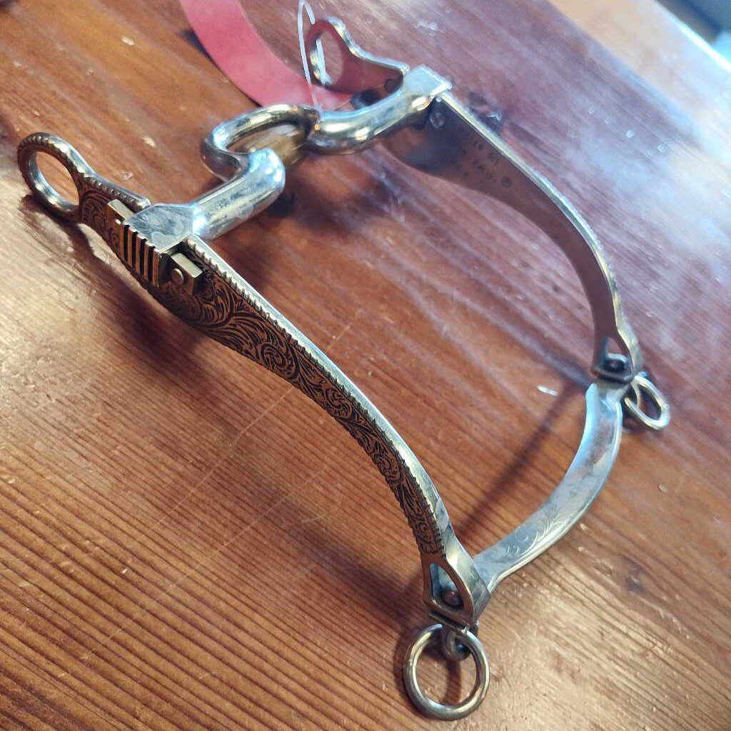 Long shank snaffle with roller- filagree detail