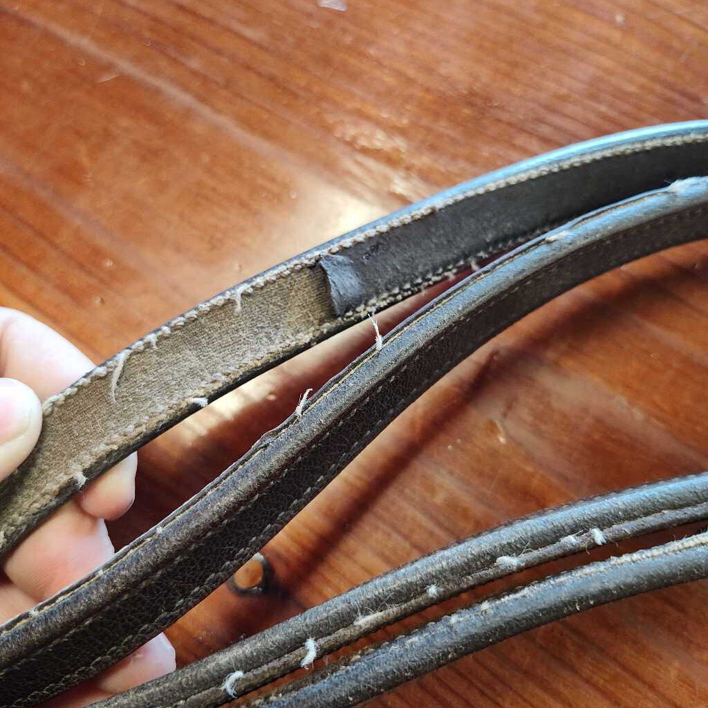 Leather and rubber english reins