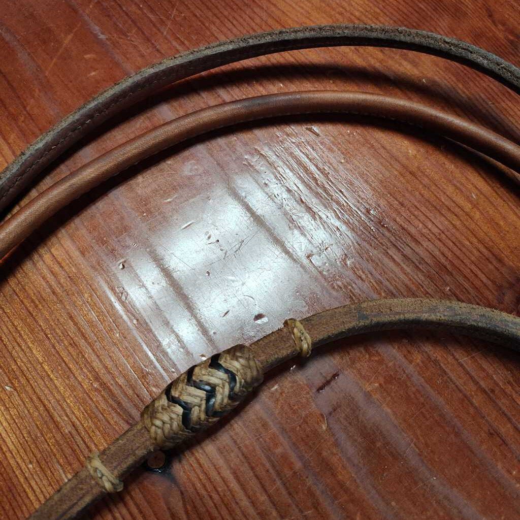 Rolled leather romel reins