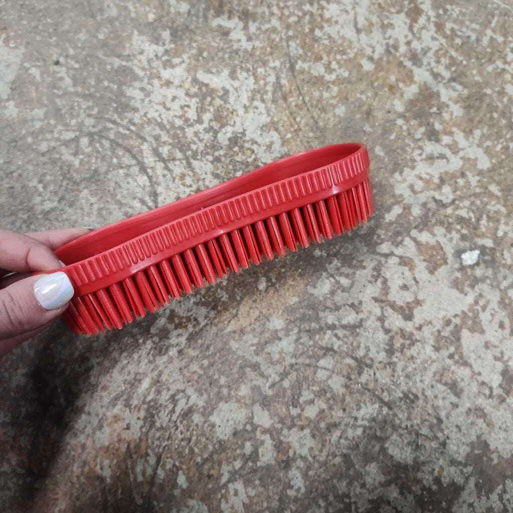 Plastic grooming brush