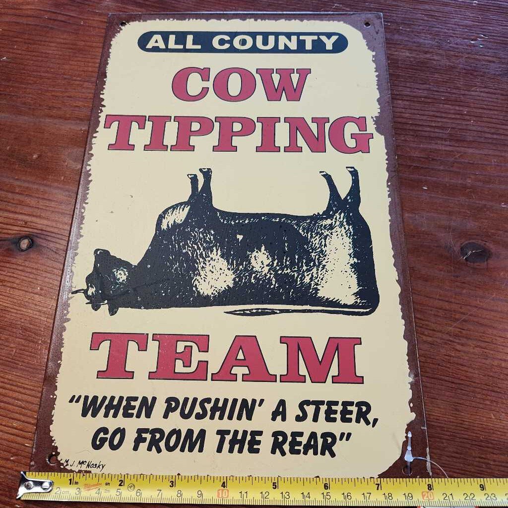 Cow tipping team