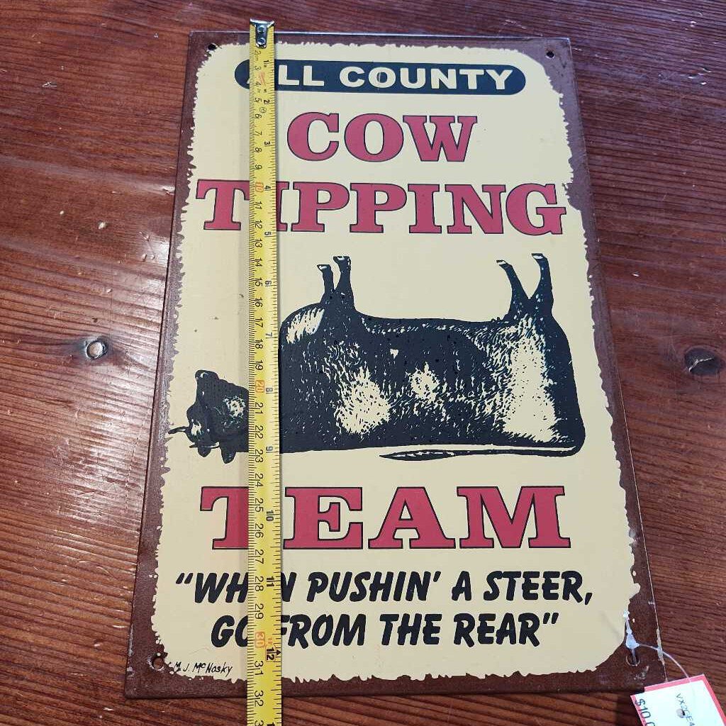 Cow tipping team