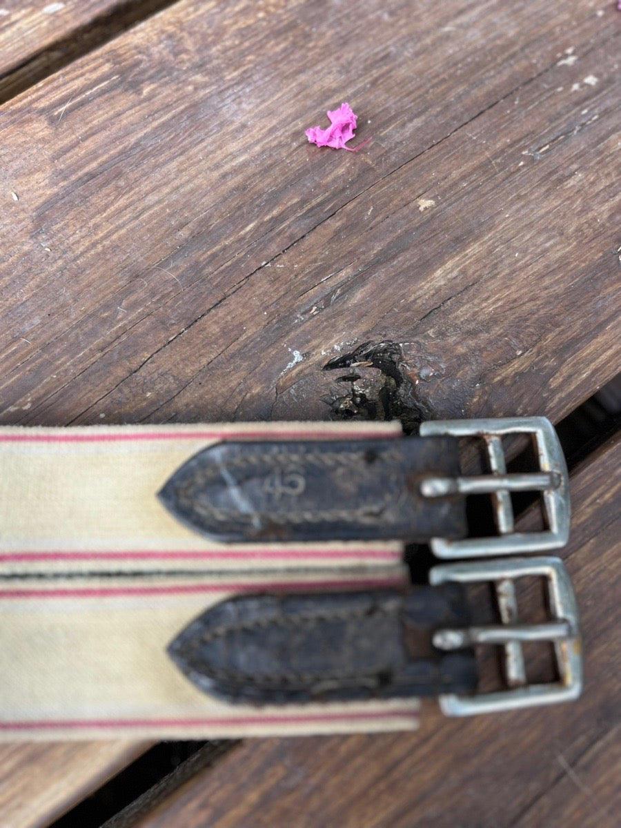 Leather girth with elastic end
