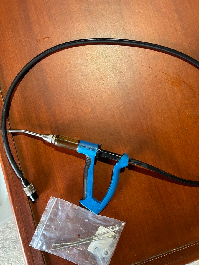 Regumate dosing gun