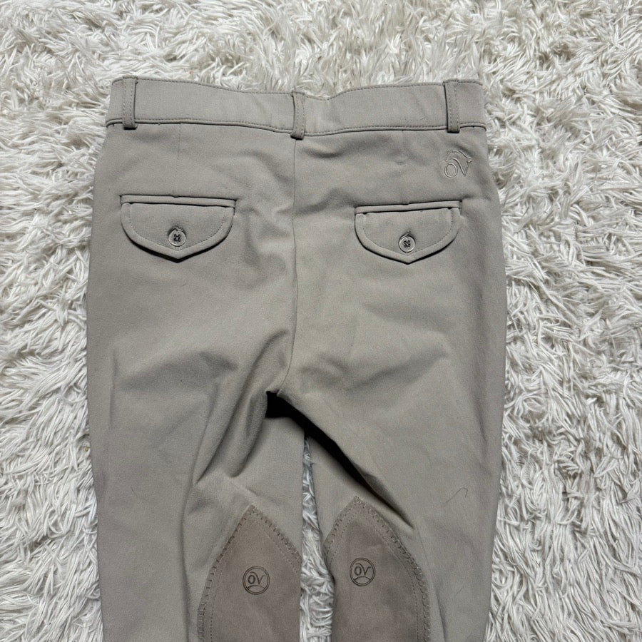 Boy’s Size 16 Tan Ovation Knee Patch Horseback Riding Breeches. Good Condition.