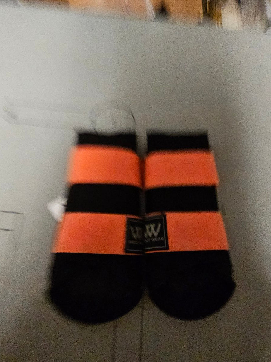 Large orange and black Woof Wear brushing boots Large