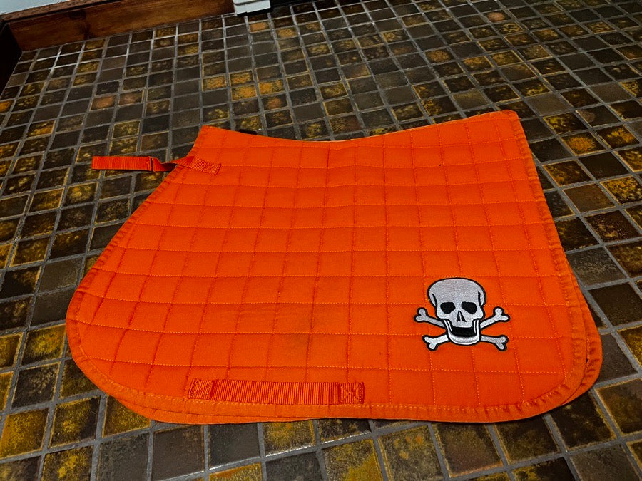 Saddle pad, boots, and ear bonnet set
