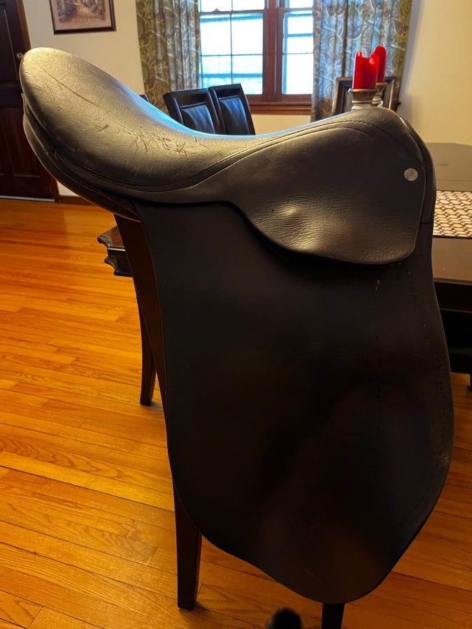 Dark brown English dressage saddle