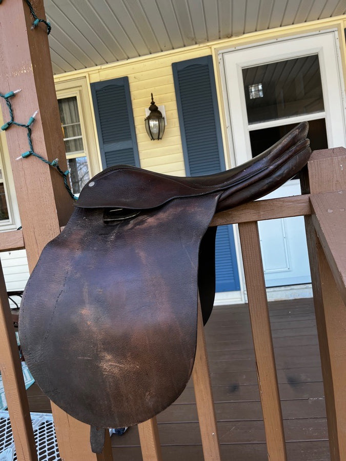 Dark brown English dressage saddle