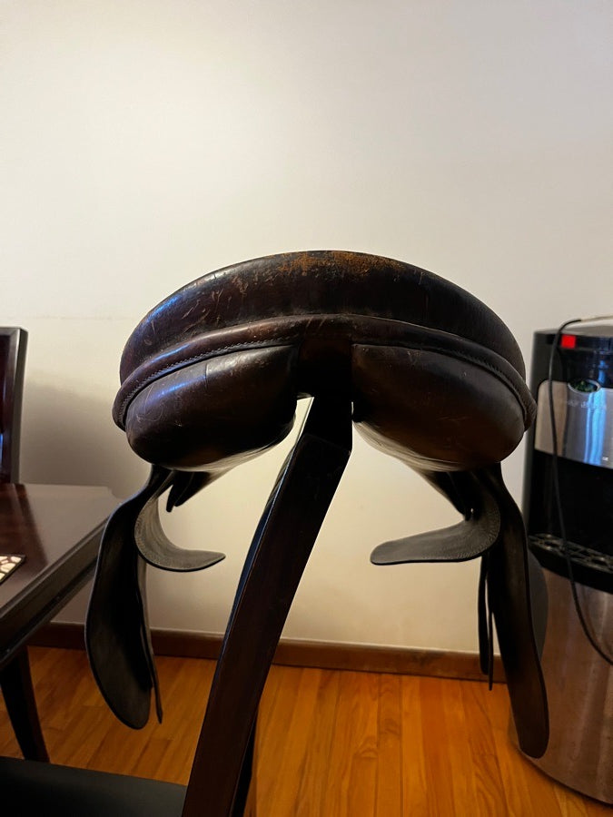 Dark brown English dressage saddle