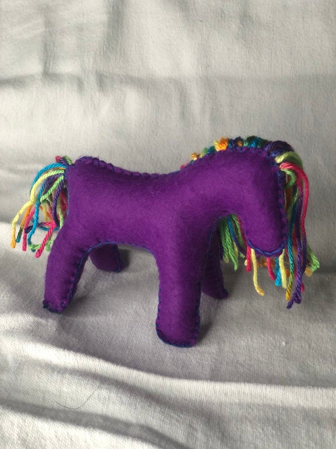 Hand sewn purple toy horse