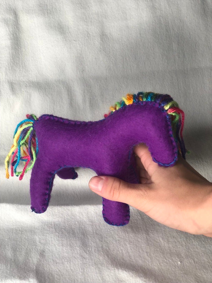 Hand sewn purple toy horse