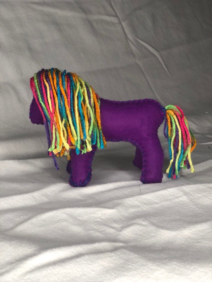 Hand sewn purple toy horse