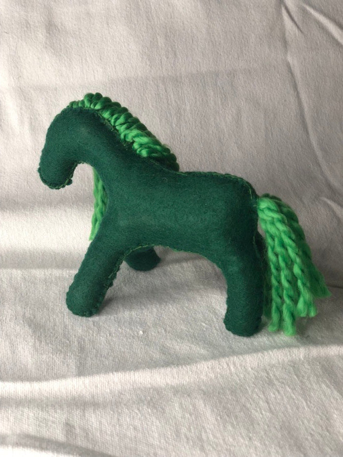 Hand sewn green toy horse