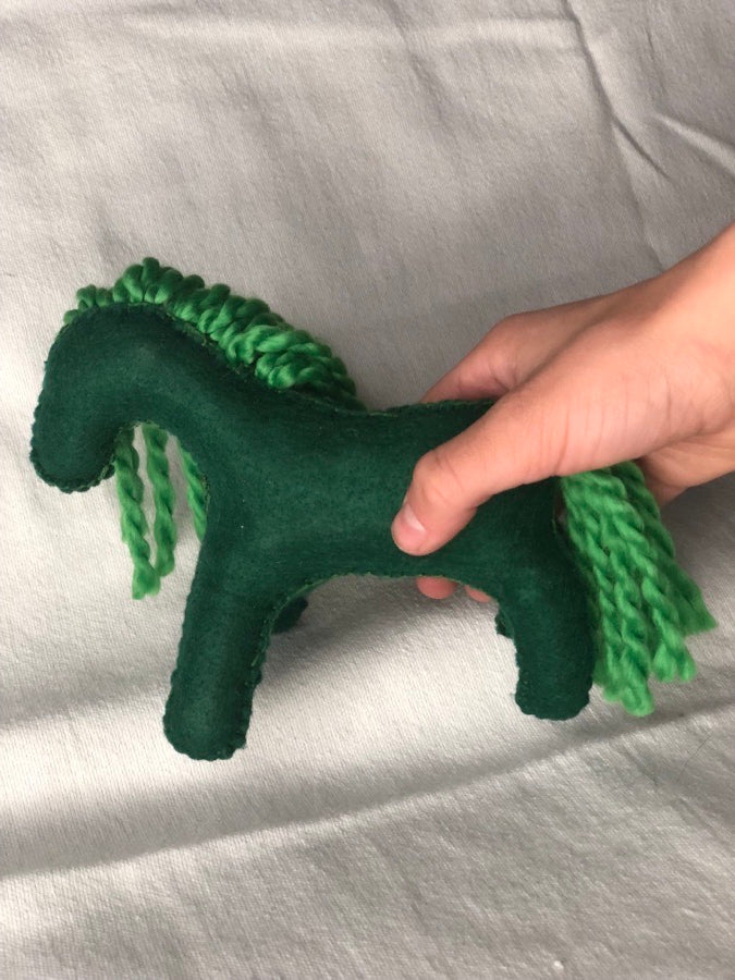 Hand sewn green toy horse