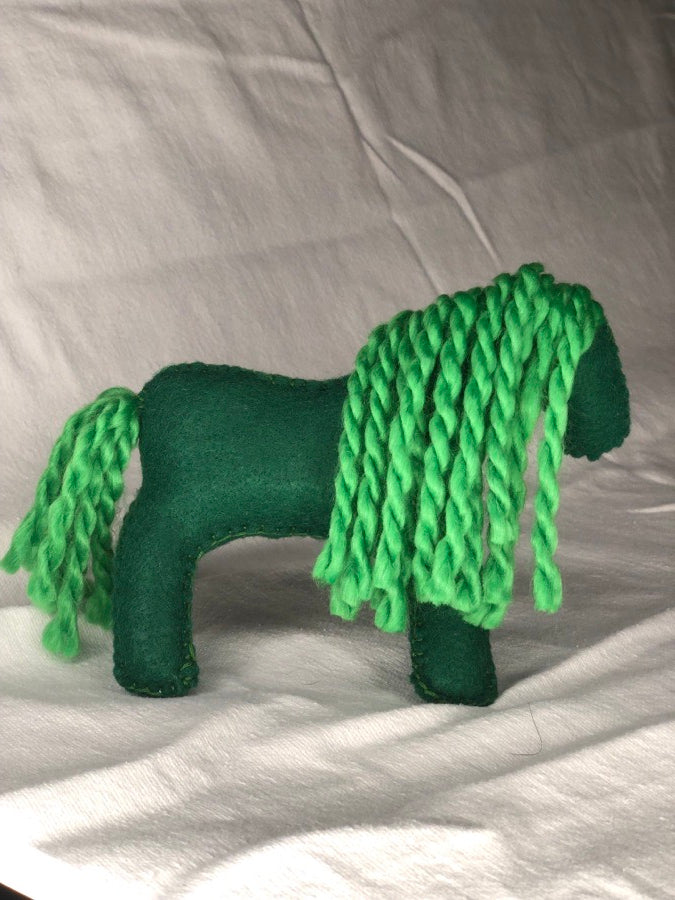 Hand sewn green toy horse