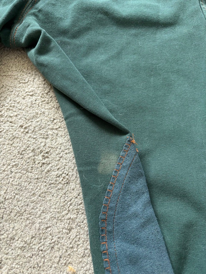 30R Piper knit, green with orange, knee patch. Good condition